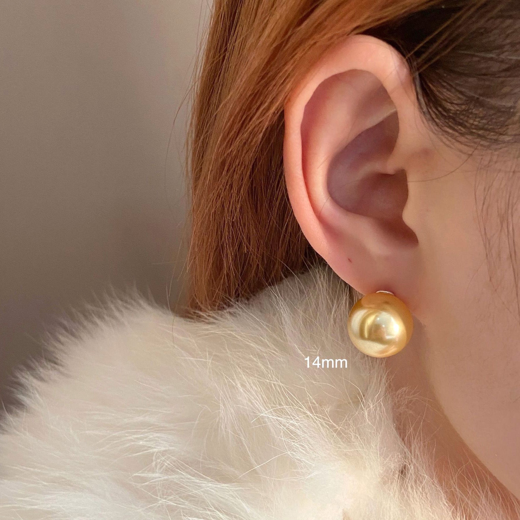 Women's large pearl stud earrings, combining style