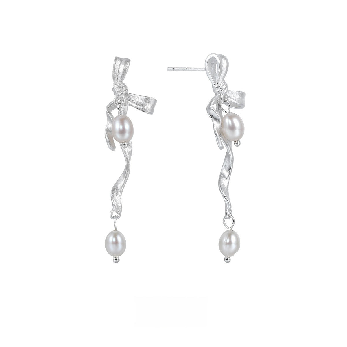 Bow-shaped stud earrings adorned with delicate pearls