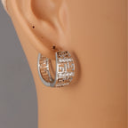 Geometric copper earrings with inlaid zircons