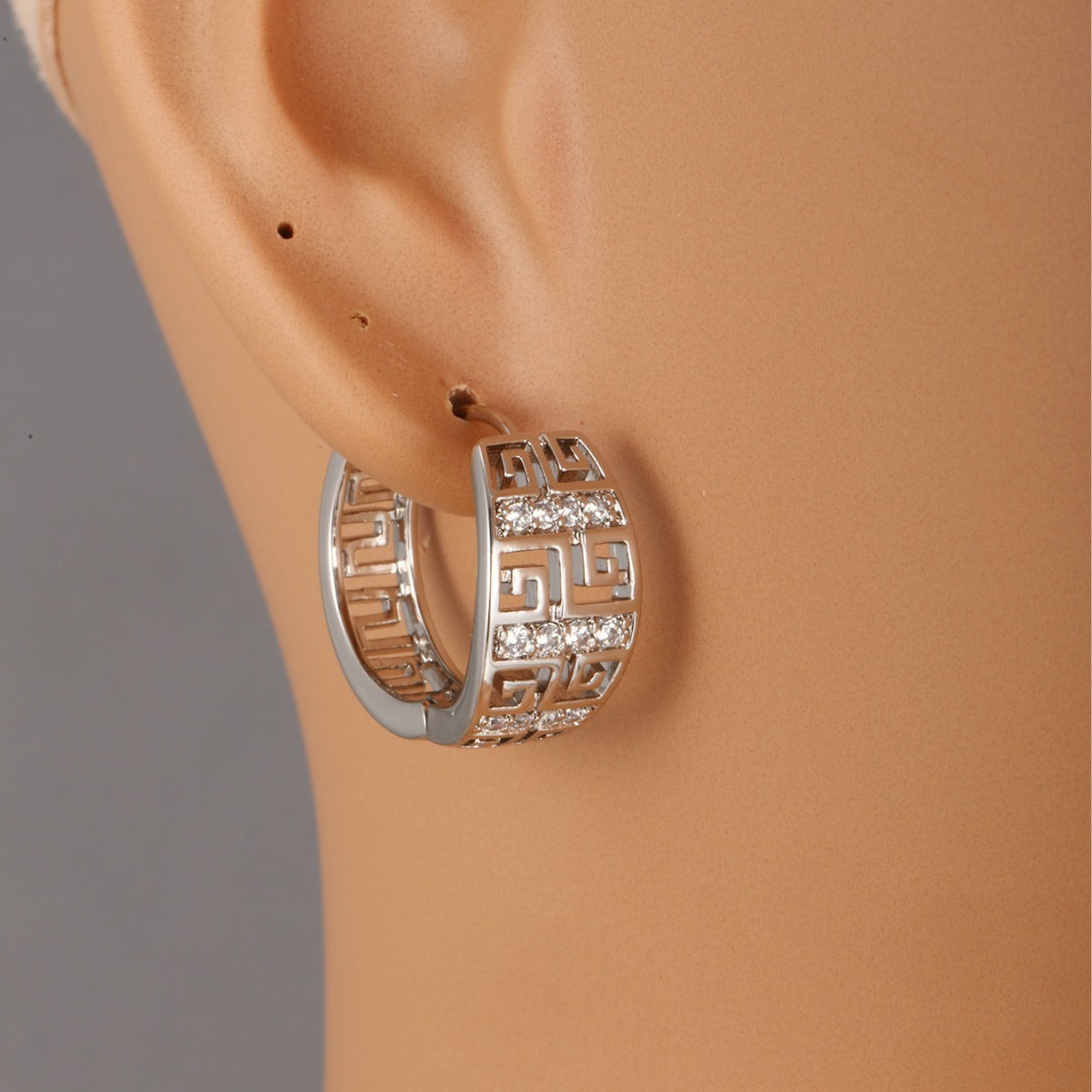 Geometric copper earrings with inlaid zircons