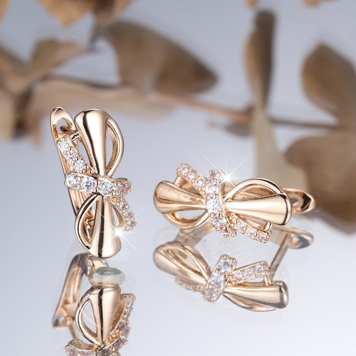 Champagne gold-plated copper clip-on earrings adorned with white diamonds
