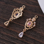 This pendant, micro-encrusted with zircon, in the shape of an openwork water drop