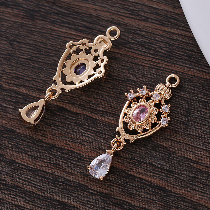 This pendant, micro-encrusted with zircon, in the shape of an openwork water drop