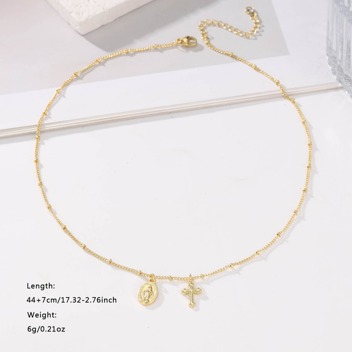 Gold Virgin Mary cross necklace