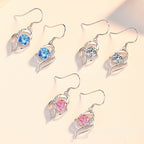 Elegant and simple heart-shaped earrings with micro-inlaid zircons