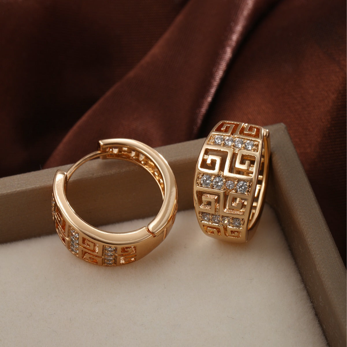 Geometric copper earrings with inlaid zircons