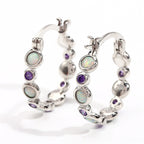 Earrings combine brilliance and delicacy, enhancing