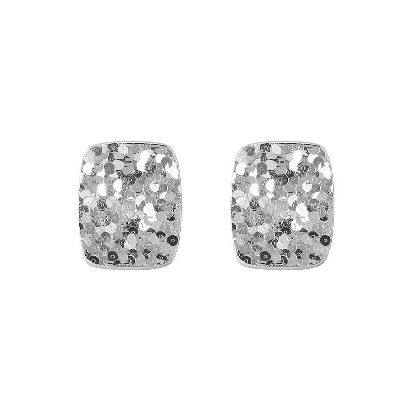 Square earrings in 925 silver, finely sculpted to evoke elegance