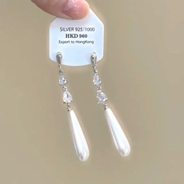 Sparkling star clip-on earrings with tassels