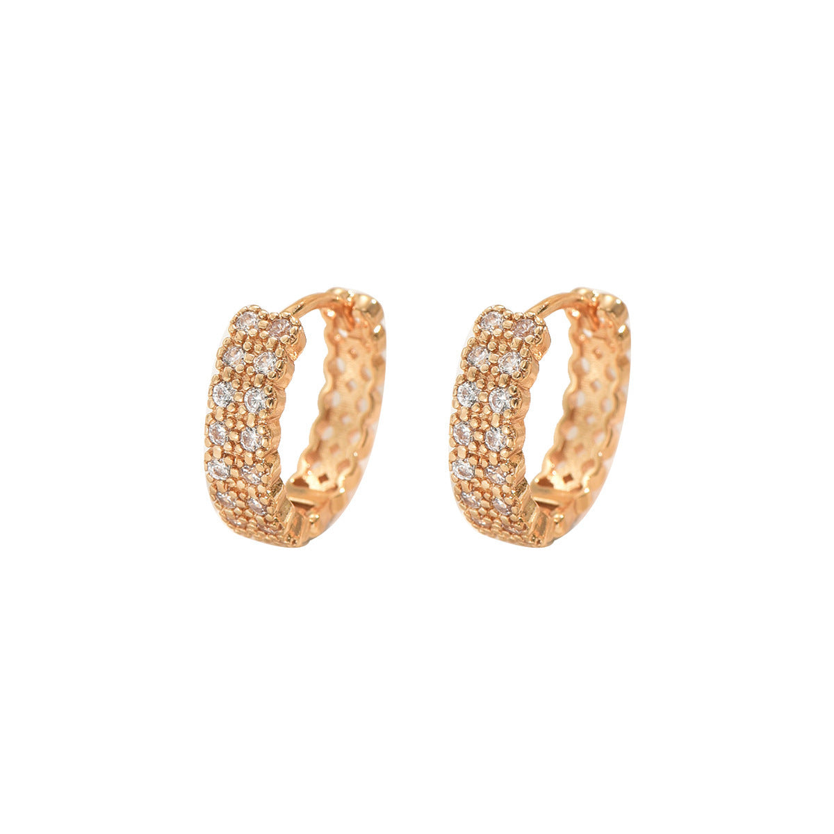 Women's earrings feature a modern geometric design, characterized by round shapes, dots and rings that harmoniously intertwine