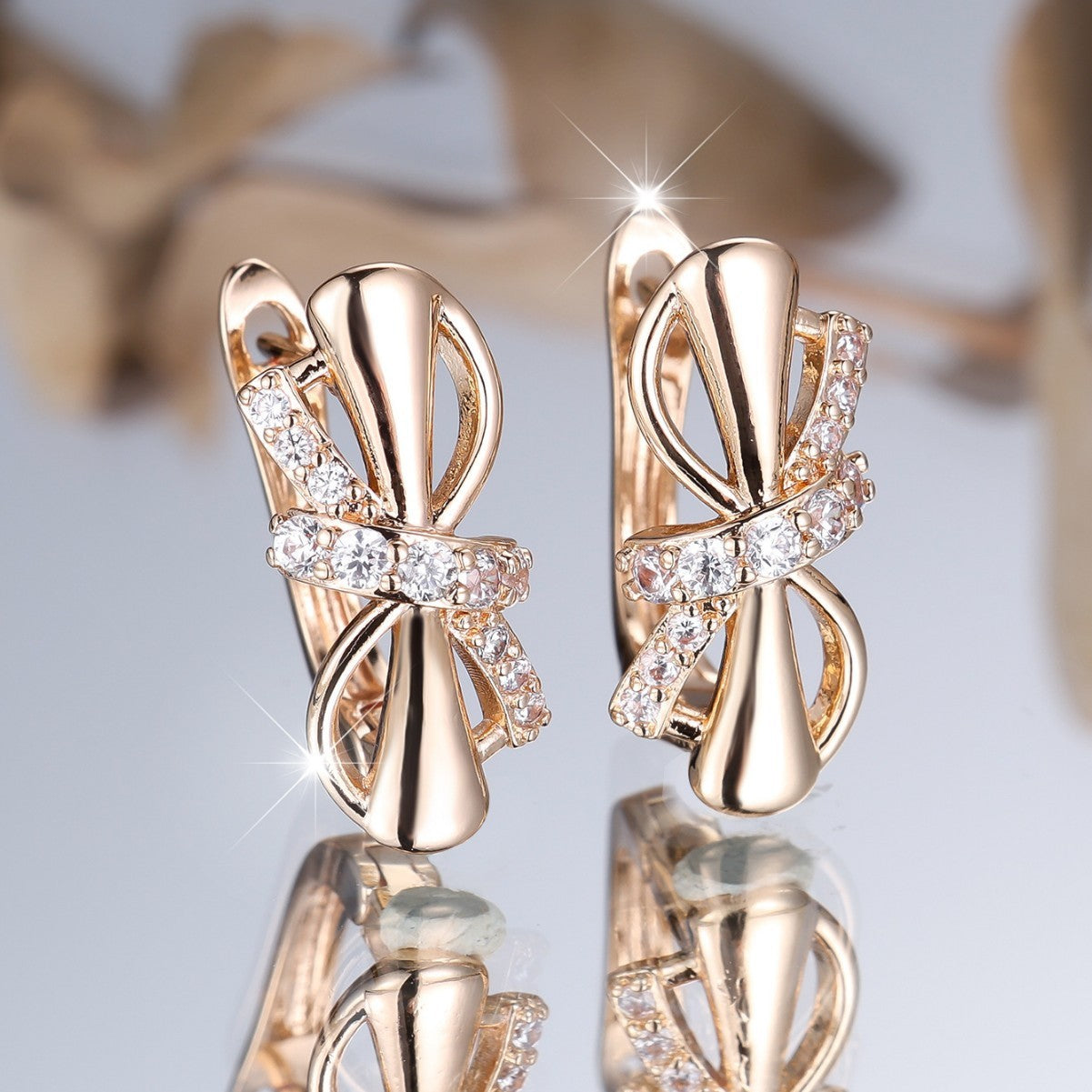 Champagne gold-plated copper clip-on earrings adorned with white diamonds