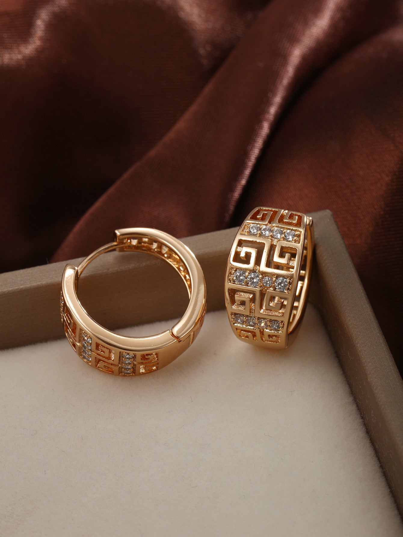 Geometric copper earrings with inlaid zircons