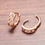 Hollow heart clip-on earrings with a shiny finish