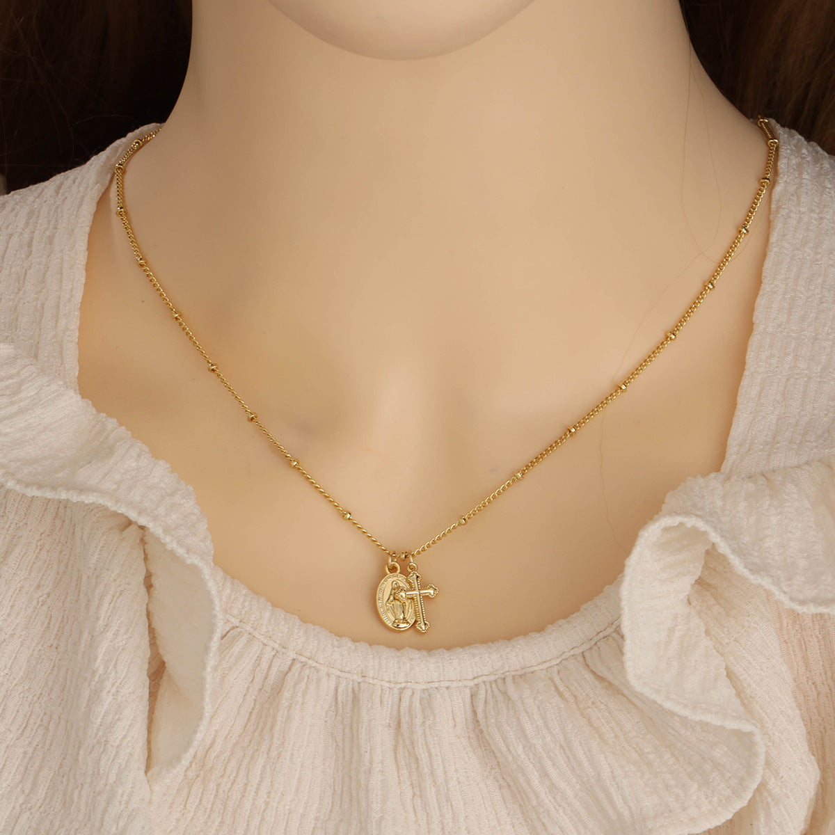 Gold Virgin Mary cross necklace