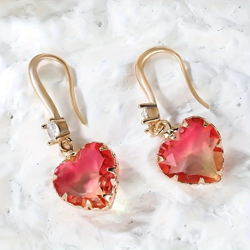 Fashion Crystal Glass Love Heart Women's Earrings These elegant heart-shaped earrings are designed to enhance every woman.