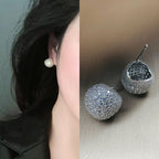 Light luxury clip-on earrings in the shape of small golden pearls adorned with diamonds