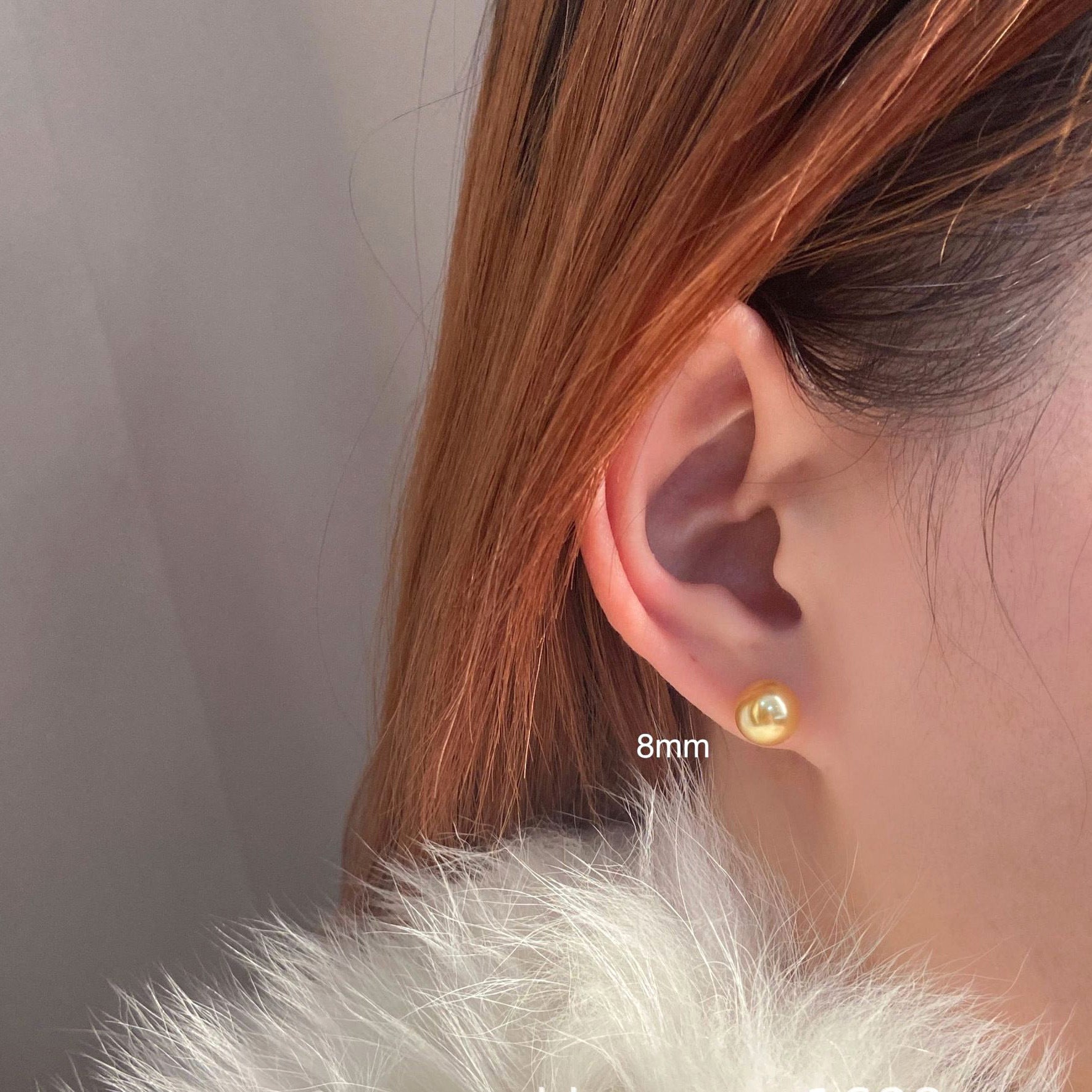 Women's large pearl stud earrings, combining style