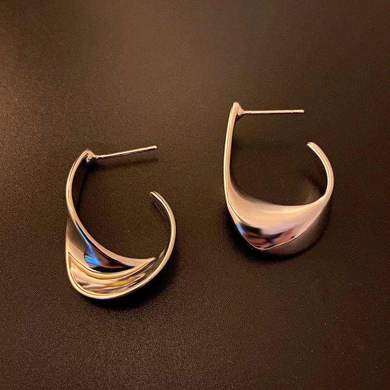 Metal Twisted Design Earrings Check out these earrings