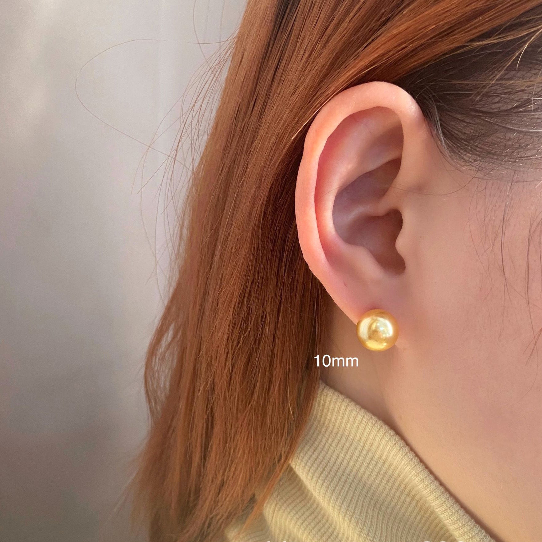 Women's large pearl stud earrings, combining style