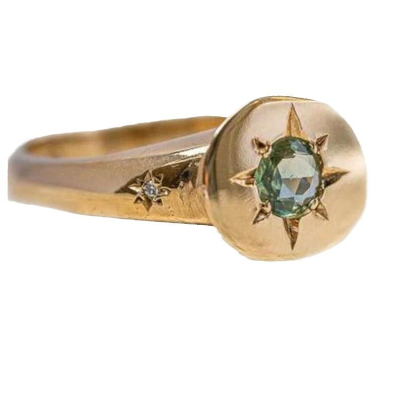 Simple temperament ring in golden oval zircon with asterism