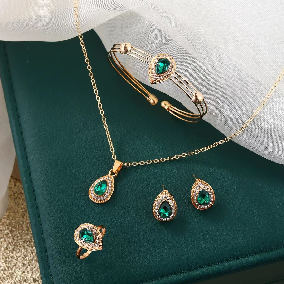 Jewelry set: matching necklace, earrings, ring and bracelet
