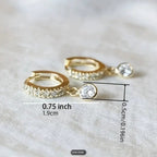 Round loop earrings fully paved with zircon
