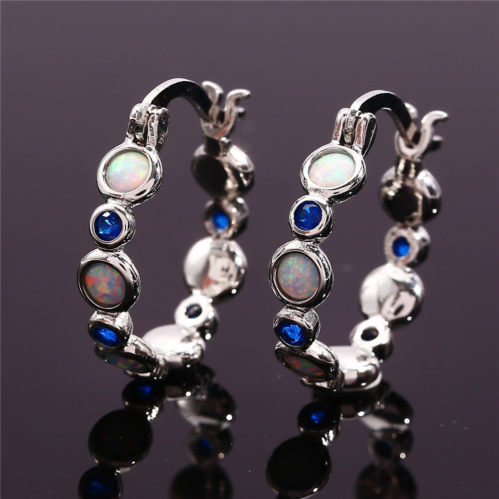 Earrings combine brilliance and delicacy, enhancing