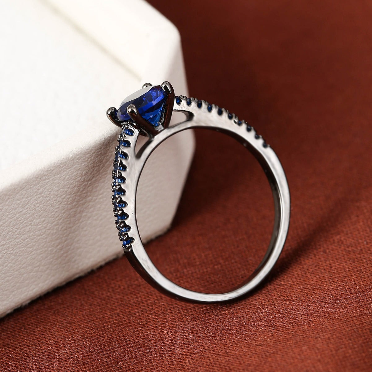 elegant copper ring seduces with its geometric hexagonal design, offering a modern and refined touch