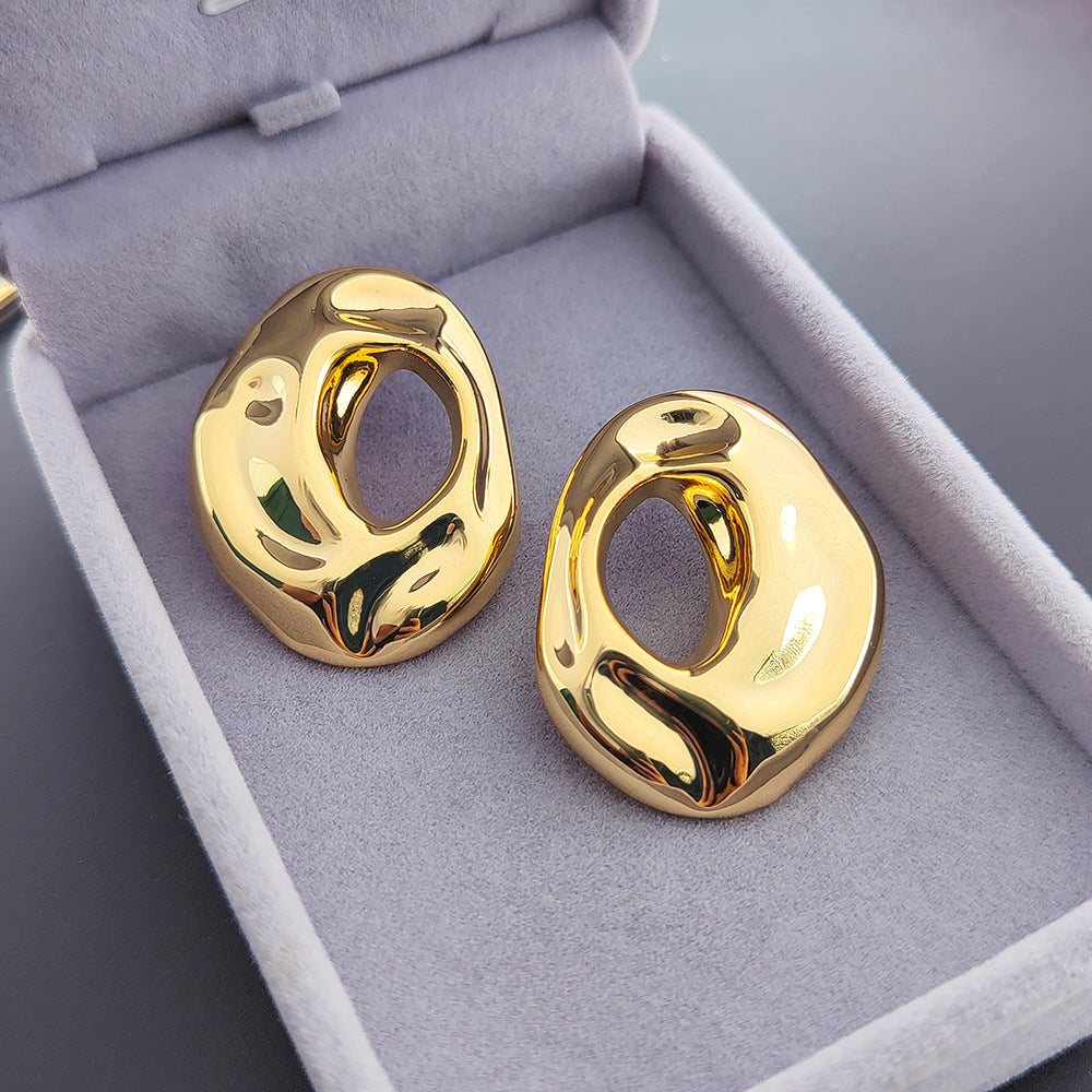 Retro metal stud earrings with irregular geometric shapes