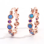 Earrings combine brilliance and delicacy, enhancing