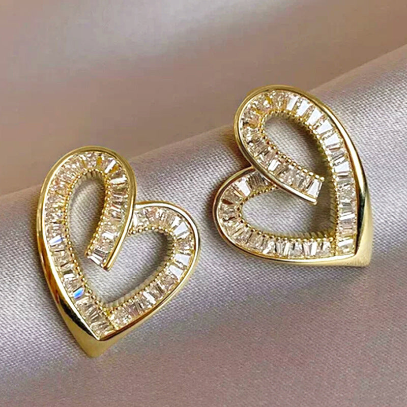 Elegant hollow heart shaped earrings with geometric design
