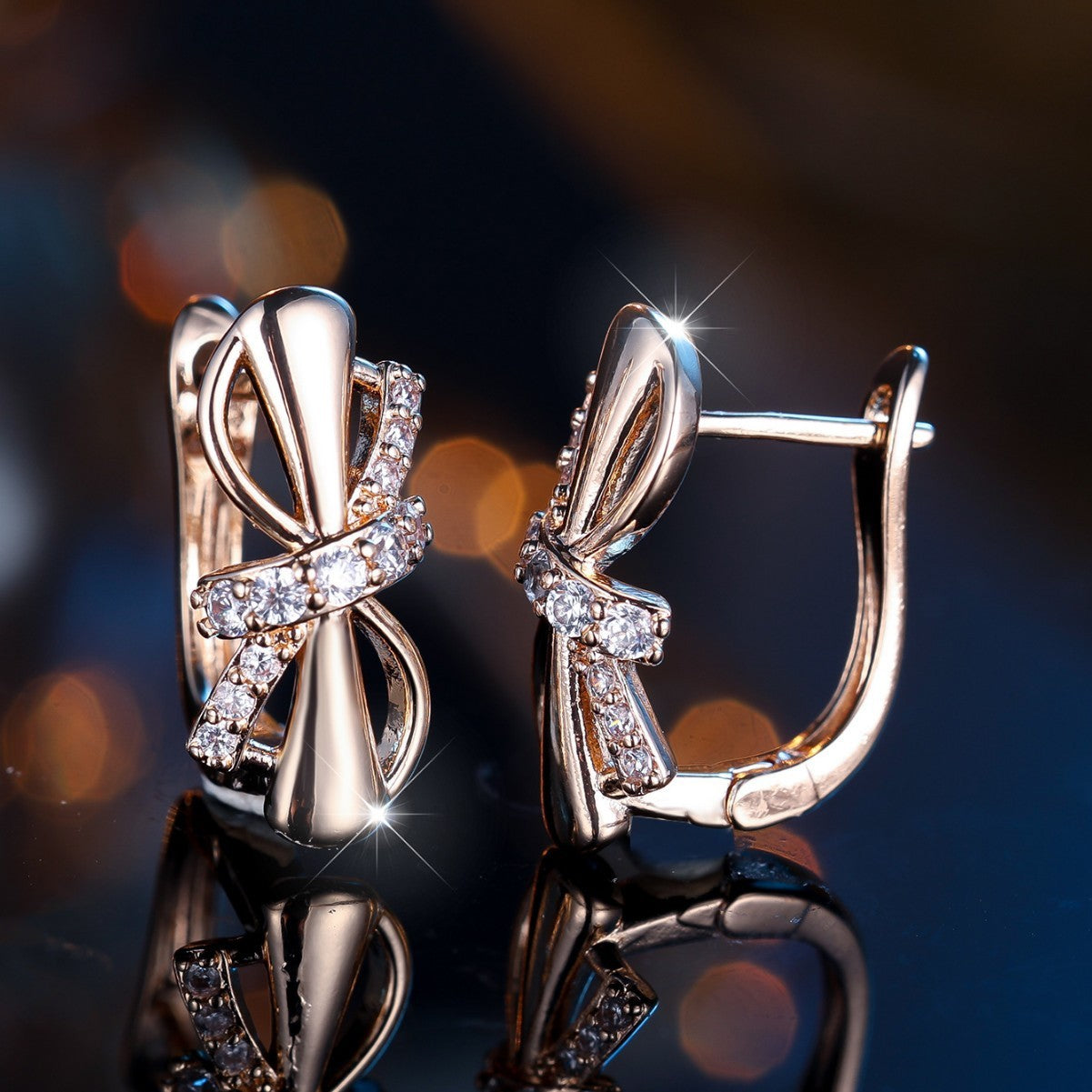 Champagne gold-plated copper clip-on earrings adorned with white diamonds