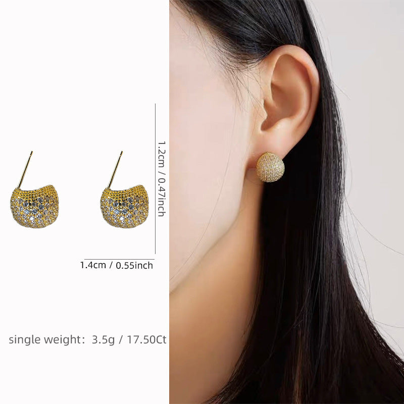 Light luxury clip-on earrings in the shape of small golden pearls adorned with diamonds
