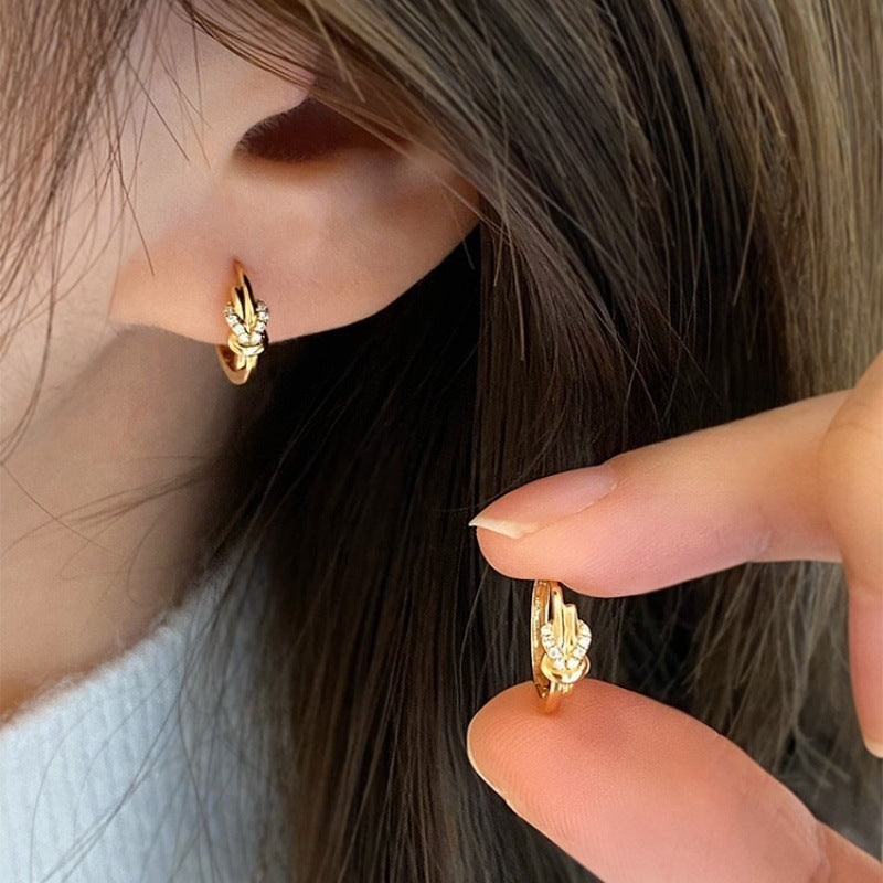 Cowhide clasp earrings, designed for women who appreciate luxury