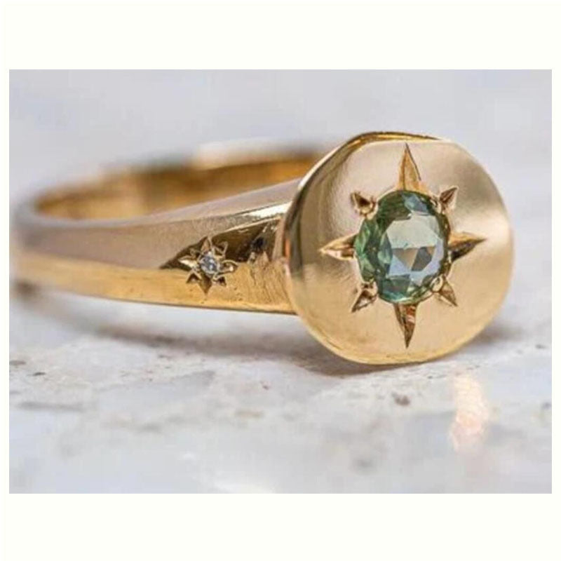 Simple temperament ring in golden oval zircon with asterism