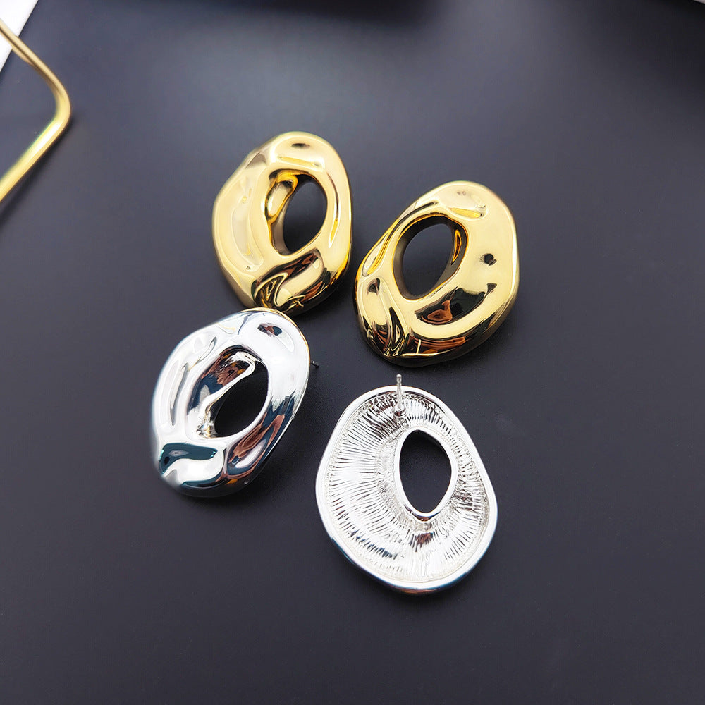 Retro metal stud earrings with irregular geometric shapes