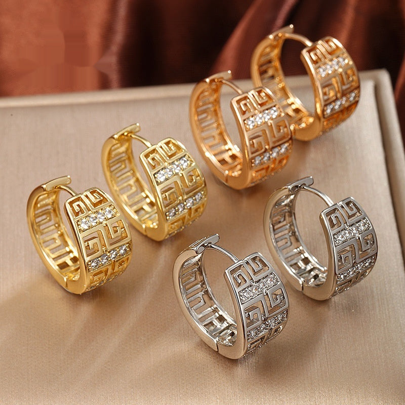 Geometric copper earrings with inlaid zircons