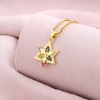 Six-pointed star shaped emerald zircon pendant necklace combines geometric design and fine craftsmanship