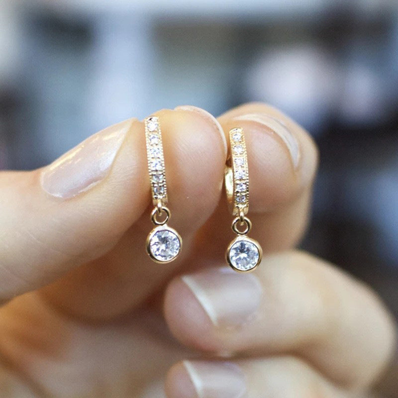 Round loop earrings fully paved with zircon