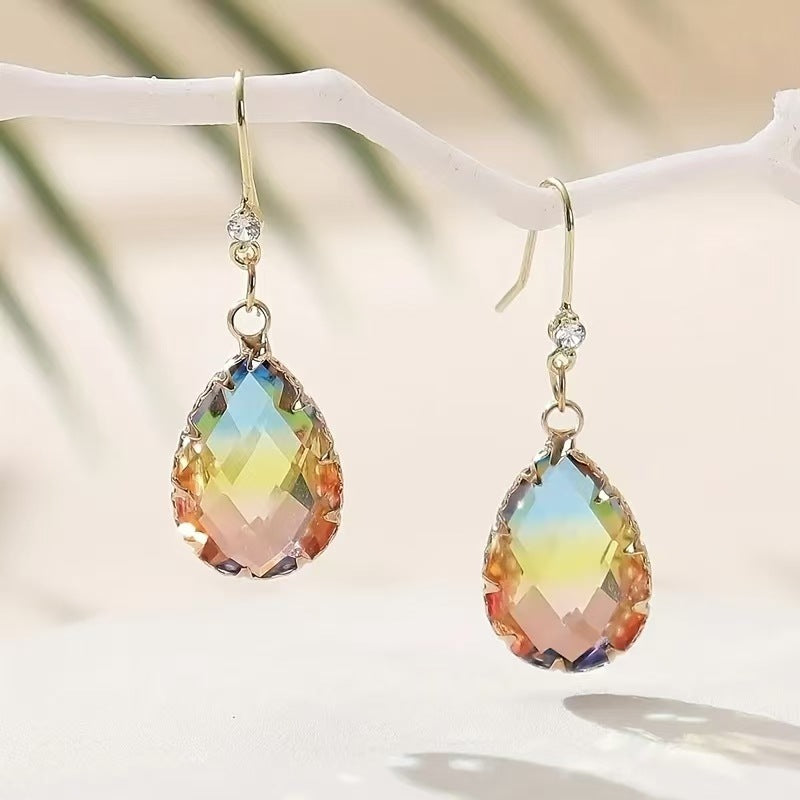 Fashion Crystal Glass Love Heart Women's Earrings These elegant heart-shaped earrings are designed to enhance every woman.