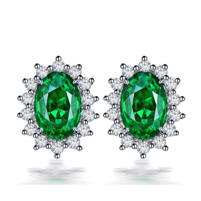 Six-prong heart-shaped earrings inlaid with zircons