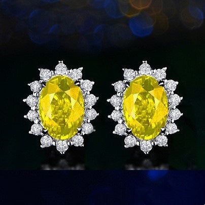 Six-prong heart-shaped earrings inlaid with zircons