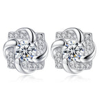 Six-prong heart-shaped earrings inlaid with zircons