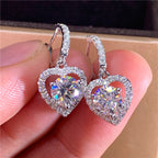 Six-prong heart-shaped earrings inlaid with zircons