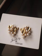 Vintage mid-antique necklace with ginkgo leaf and pearls, frosted brushed effect