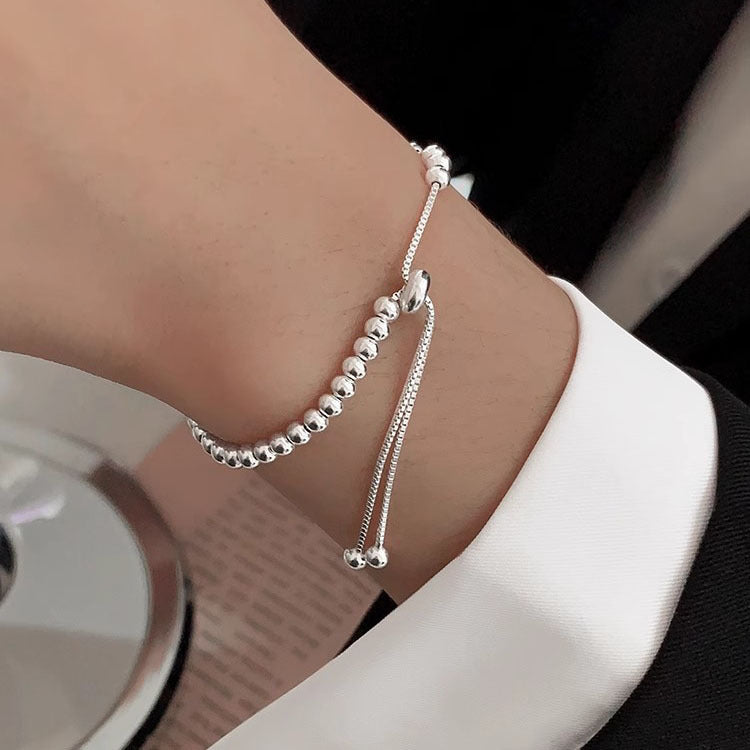 Simple and versatile silver round bead bracelet for women. New and simple