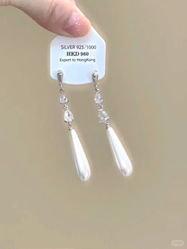 Sparkling star clip-on earrings with tassels