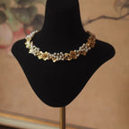 Vintage mid-antique necklace with ginkgo leaf and pearls, frosted brushed effect