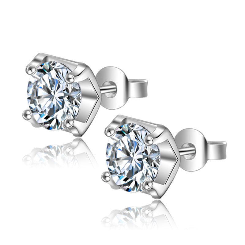 Six-prong heart-shaped earrings inlaid with zircons