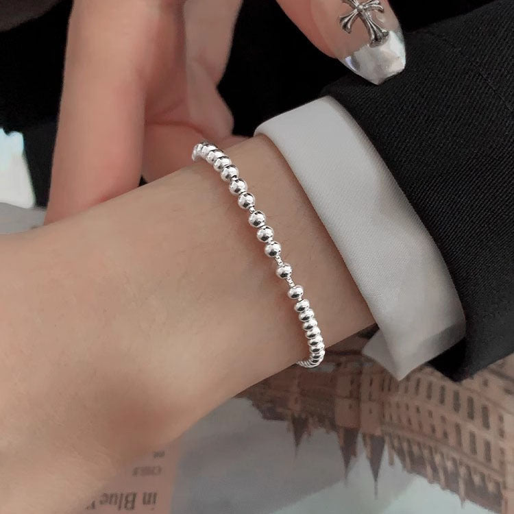 Simple and versatile silver round bead bracelet for women. New and simple